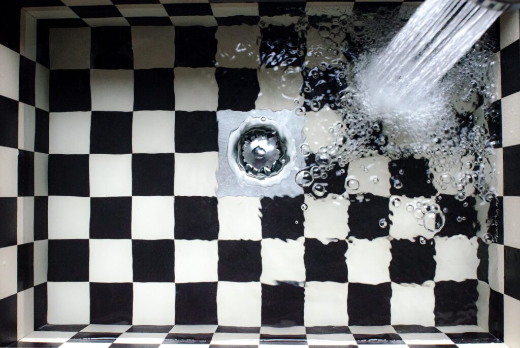 Drain Backing Up? Why You Should Consider Clogged Drain Service from Custom Plumbing